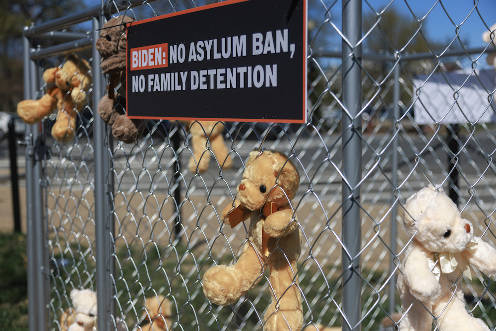 Stuffed animals are placed in cages behind a fence, as part of a protest organized by the ACLU, the We Are All America organization and the Women's Refugee Commission, near the White House in Washington, D.C.