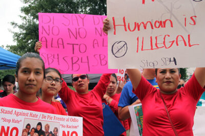 Austin, Texas, USA - May 29, 2017: A Hispanic mother and her daughter protest SB 4, an anti-Sanctuary Cities immigration law, outside the Capitol.